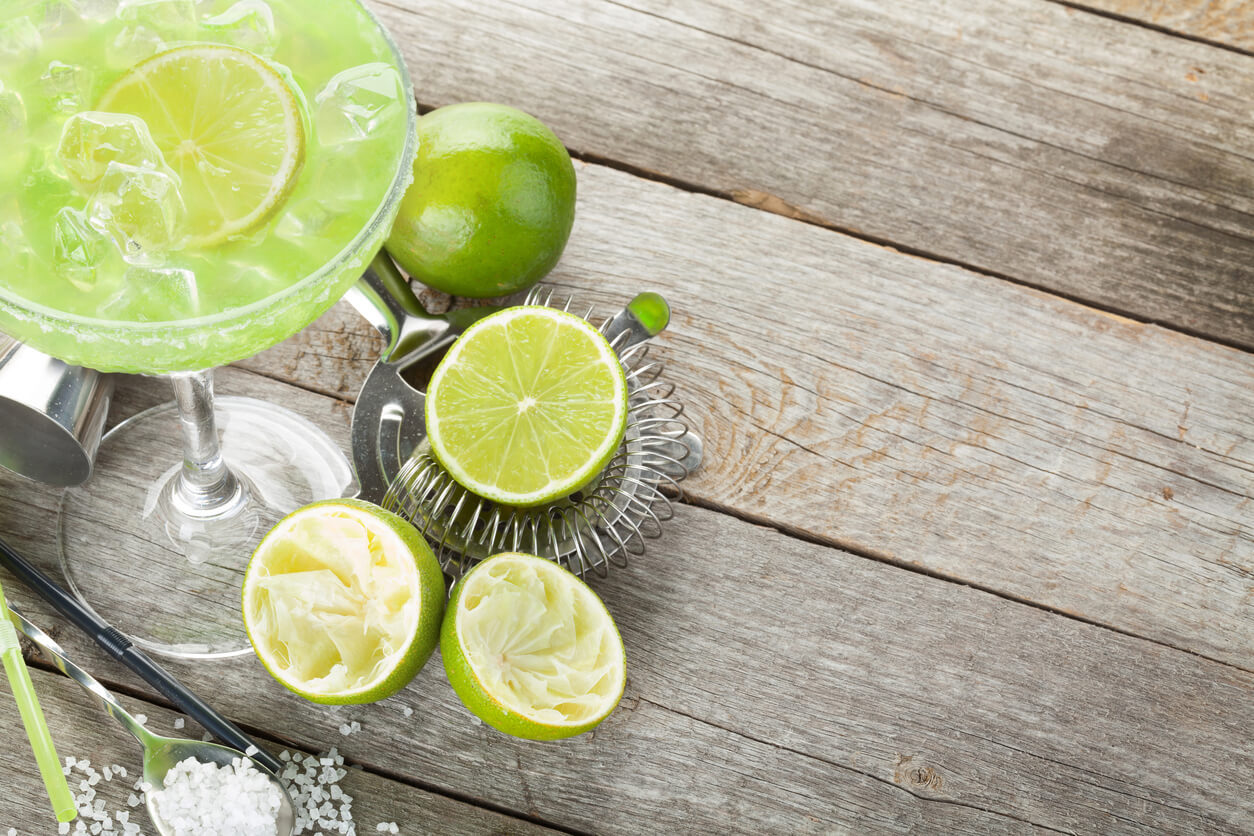 Fresh margarita with limes for National Margarita Day