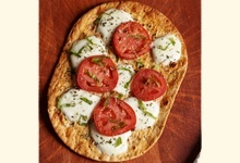 Tomato basil thin-crust low carb pizza